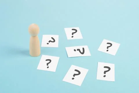 Man is thinking, question marks, brainstorming and looking for answers, solving Stock Photos