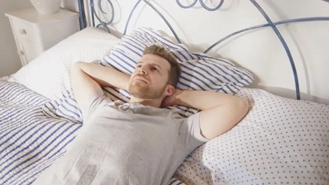 Man Thinking Reflective Thoughtful Resting Relaxing Sleeping Bed Day Time Stockbeeldmateriaal 195287533