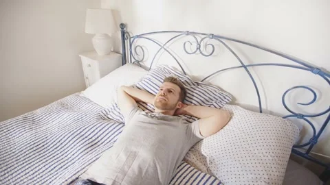 Man Thinking Reflective Thoughtful Resting Relaxing Sleeping Bed Day Time Vídeo Stock 195287546
