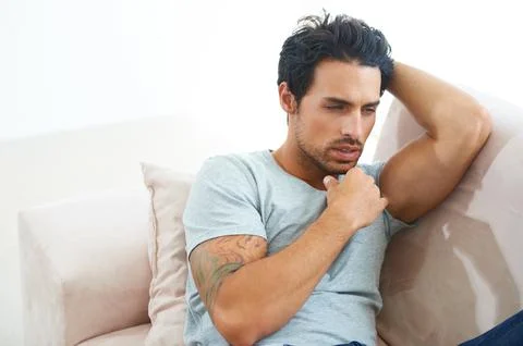 Man, thinking on sofa in home as decision idea or problem solving, future Stock Photos