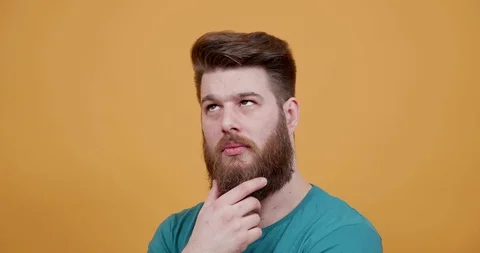 Man thinking of something and gets enthusiastic finding a solution Stock Footage 104282408