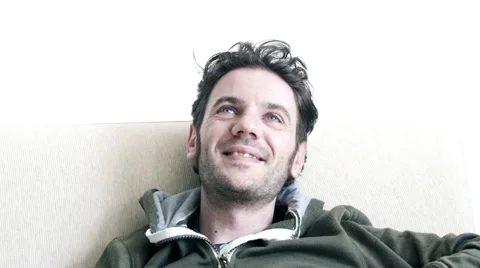 Man thinking of something funny Stock Footage 63249277