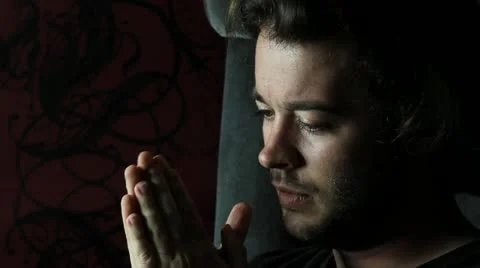 Man thinks in shadow - HD Stock Footage 12239616