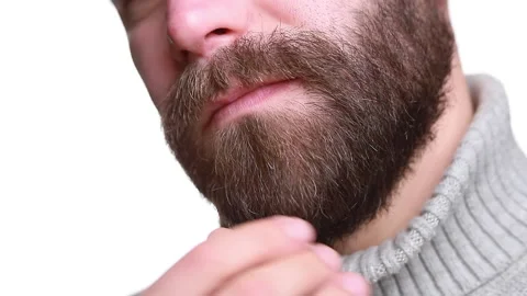 Man thinks stroking his black long beard Stock Footage 168905139