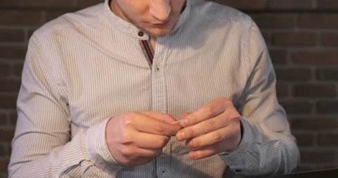 Man Threading Needle, Leather Craftsman Creates Product with his Hands Stock Footage 133009301