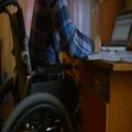 The man throw a paper from the table. Slow motion 4k or 4k+ Resolution