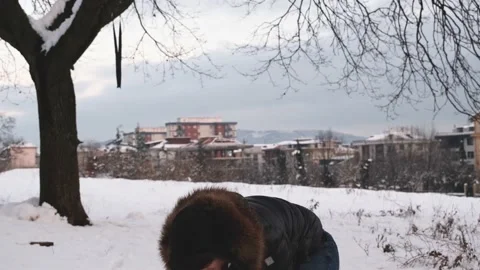 Man throw snowballs Stock Footage 170675153