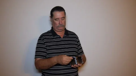 MAN THROWING AWAY DVDs and CDs Stock Footage 52945916