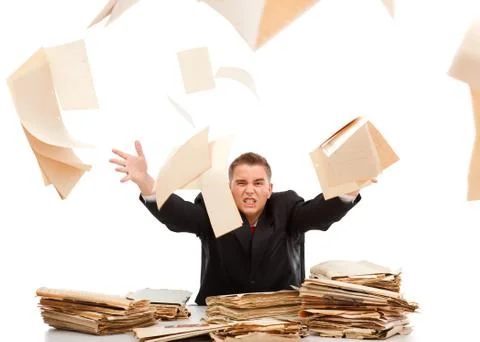 Man throwing away paperwork Stock Photos