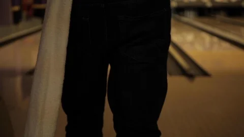 Man Throwing Bowling Ball down Lane Stock Footage 114017185