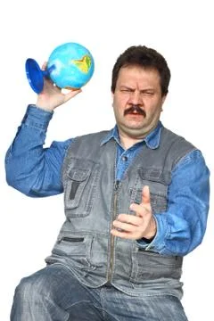 Man throwing globe Stock Photos
