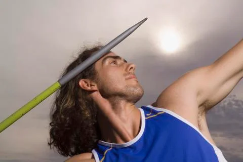 Man throwing a javelin Stock Photos
