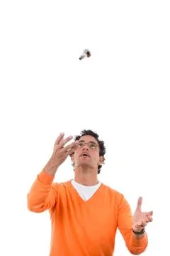 Man throwing light bulb in the air Stock Photos