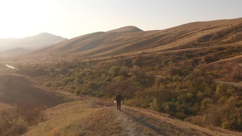 Man throwing papers on nature Stock Footage 100988427