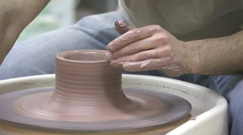 Man throwing pot on a pottery wheel Video stock 10605066
