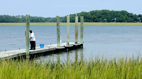Man throwing a shrimp net Stock Footage 67456421