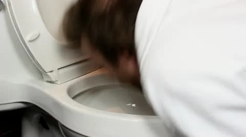 Man throwing up in toliet V1 - HD Video stock 12244545