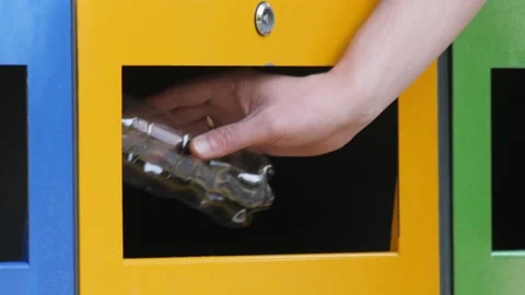 Man throwing trash container waste management. Hand throwing bottle plastic Stock Footage 172219512