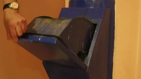 Man Throwing Waste Into Garbage Chute in the evening Stock Footage 158505309