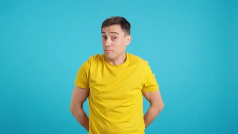 Man throws confetti on himself as he smiles in ecstasy Vídeo Stock 246228986