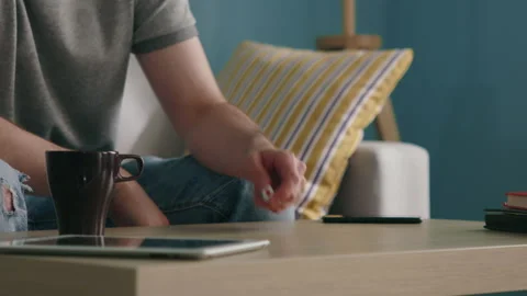 Man Throws Dice and Drinks Coffee Video stock 132431837