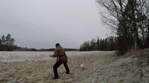 Man throws frisbee and then struggles to get it back Stock Footage 145673208