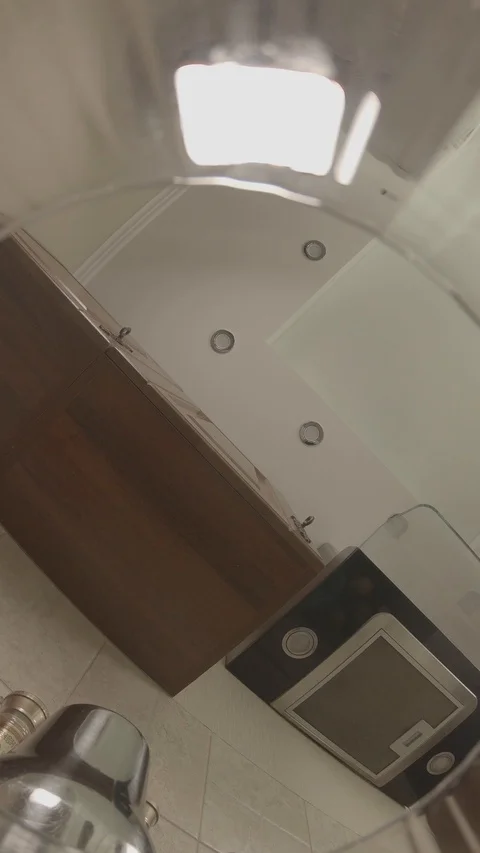 Man throws ice into a glass Stock Footage 130051174