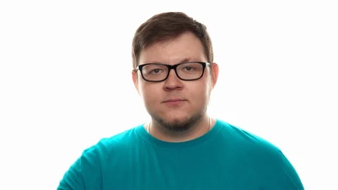 A man throws up a mandarin and catches it with his mouth Stock Footage 112770378