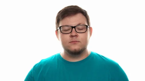 A man throws up a mandarin and catches it with his mouth Stock Footage 112770866