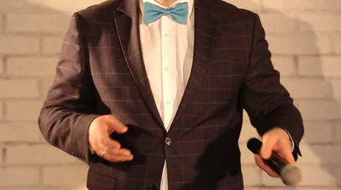 Man throws the microphone from hand to hand Stock Footage 61838051