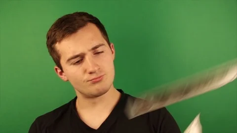A man throws money on a green background. slow motion Vídeo Stock 118855358