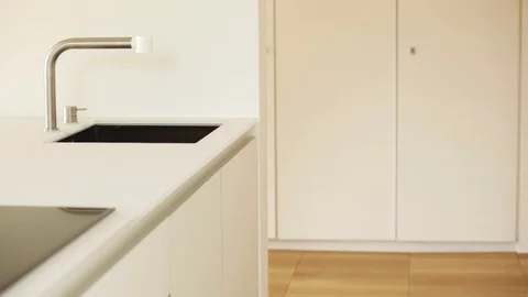 Man throws an object in the trash in the kitchen Stock Footage 116978687