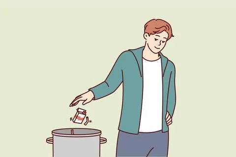 Man throws pack of cigarettes into trash can after quitting bad habit of s... Stock Photos