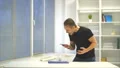 The man throws the phone on the table. slow motion 4k or 4k+ Resolution