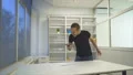 The man throws the smartphone on the table. slow motion 4k or 4k+ Resolution