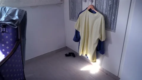 Man throws socks on the floor. Reason for divorce 4K Video stock 220614675