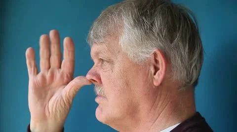 Man thumbing nose Stock Footage 10797692