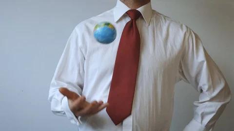 Man in a tie with a red colour, is throwing the globe Stock Footage 114929063