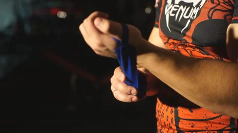 A man ties a hand in front of the box Stock Footage 62217058