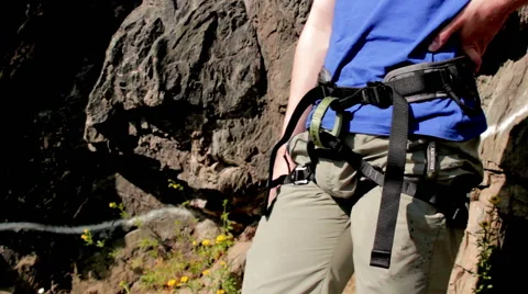 Man Ties A Knot To Climbing Harness Stock Footage 54322100