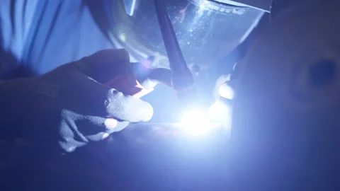 Man TIG Welding Pipe On A Rotary Table Video stock 234438593
