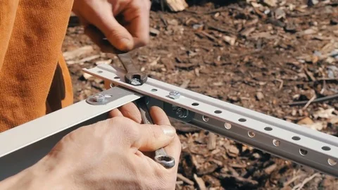 Man tighten the nut Stock Footage 74238891