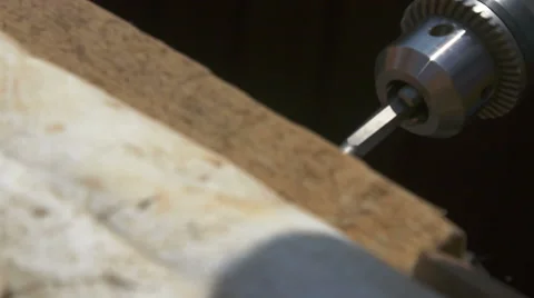 A man tightening the bolt with a drill Stock Footage 64776561