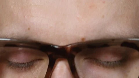 Man Tilting Head and Looking at Camera Video stock 103530474