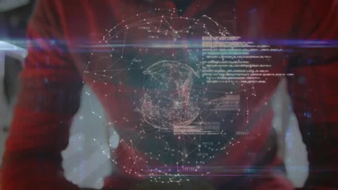 Man tilting smartphone on table generating rotating tech globe with code panels Stock Footage 315530356