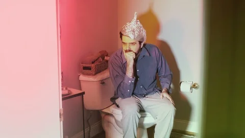 Man with a tin foil hat 스톡 동영상 105273547