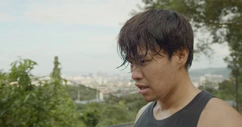 A man tired after workout - medium shoot Stock Footage 146096387