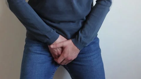 Man took himself for a dick because he wants to go to the toilet and ran away. Stock Footage 130638528