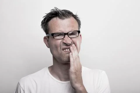 Man with toothache Stock Photos