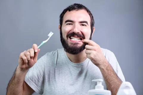 Man with Toothbrush Stock Photos